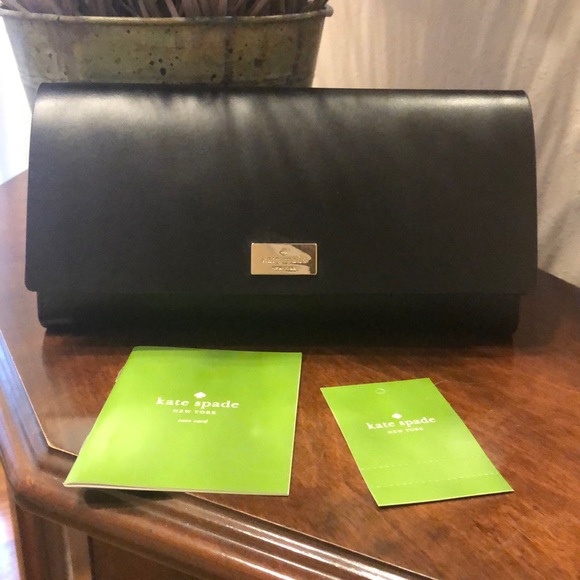 kate spade Handbags - NWT 100% Authentic Kate Spade Black Wallet w/ pink